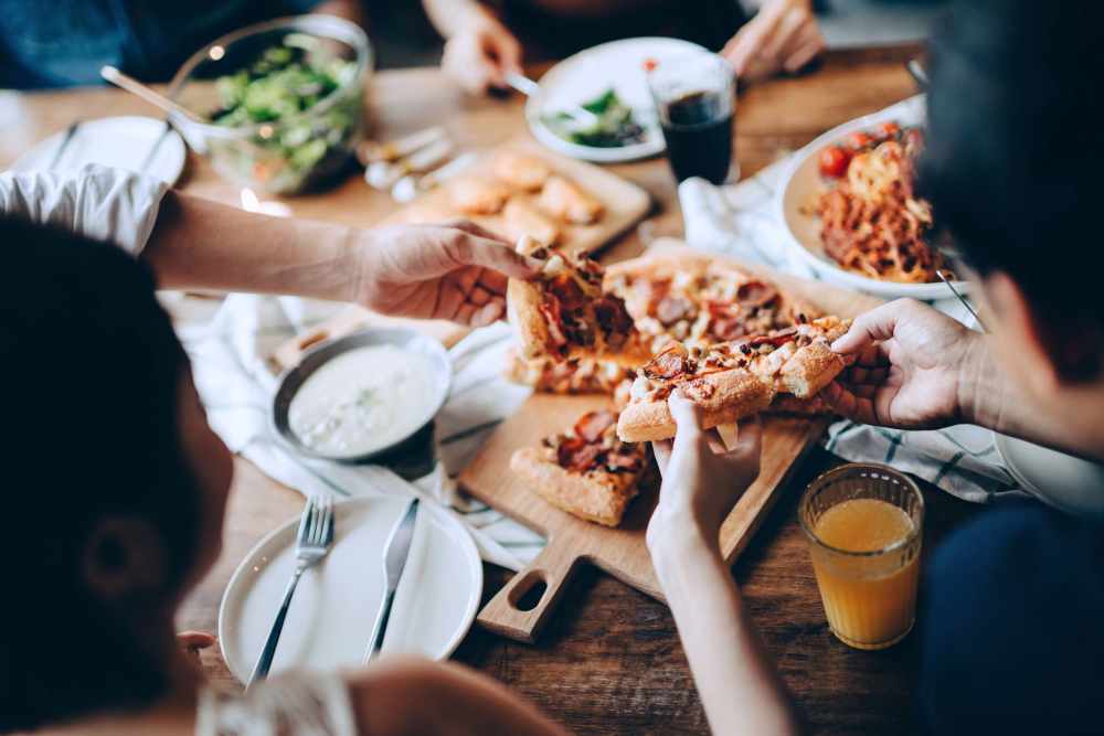 Friends at their favorite restaurant near Troup Townhomes in Troup, Texas