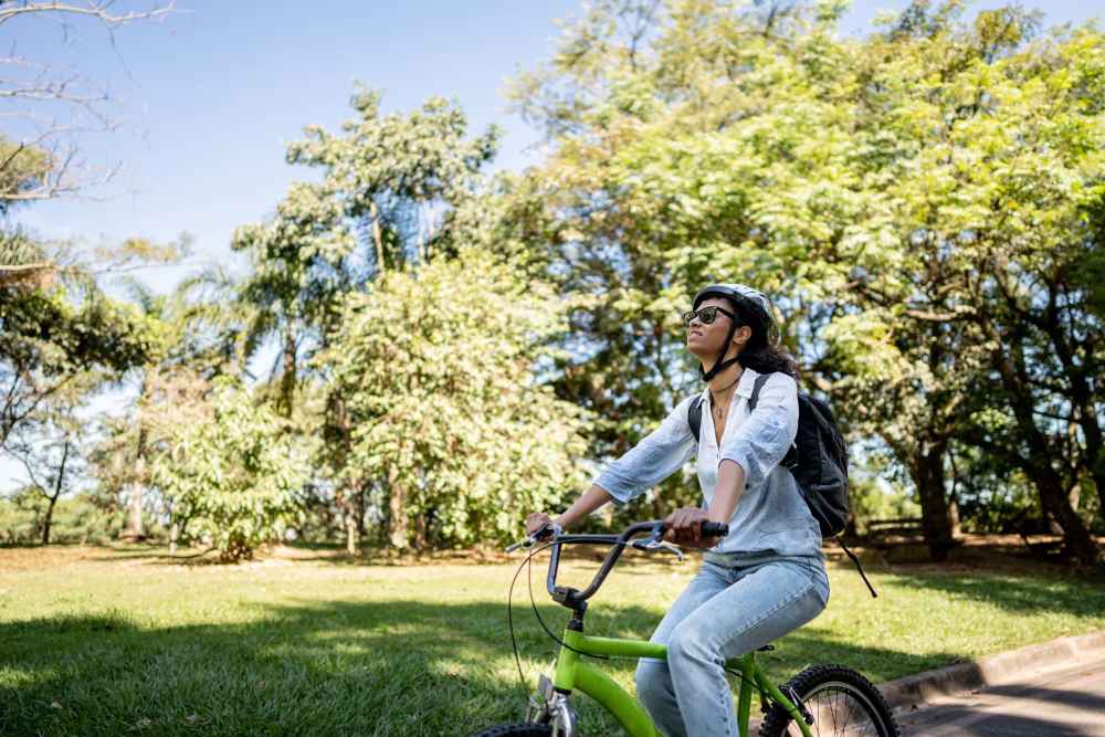 Resident woman on a bicycle near Bay Terrace in Baytown, Texas