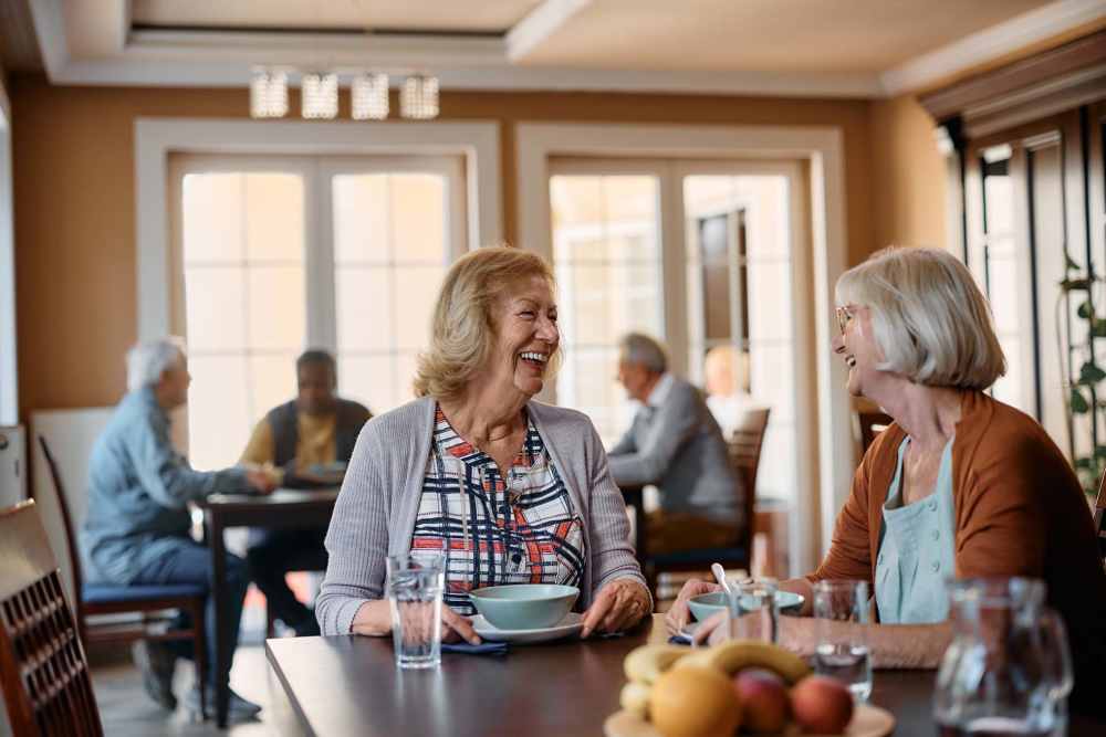 Residents at a restaurant near Homestead Village Pensacola in Pensacola, Florida