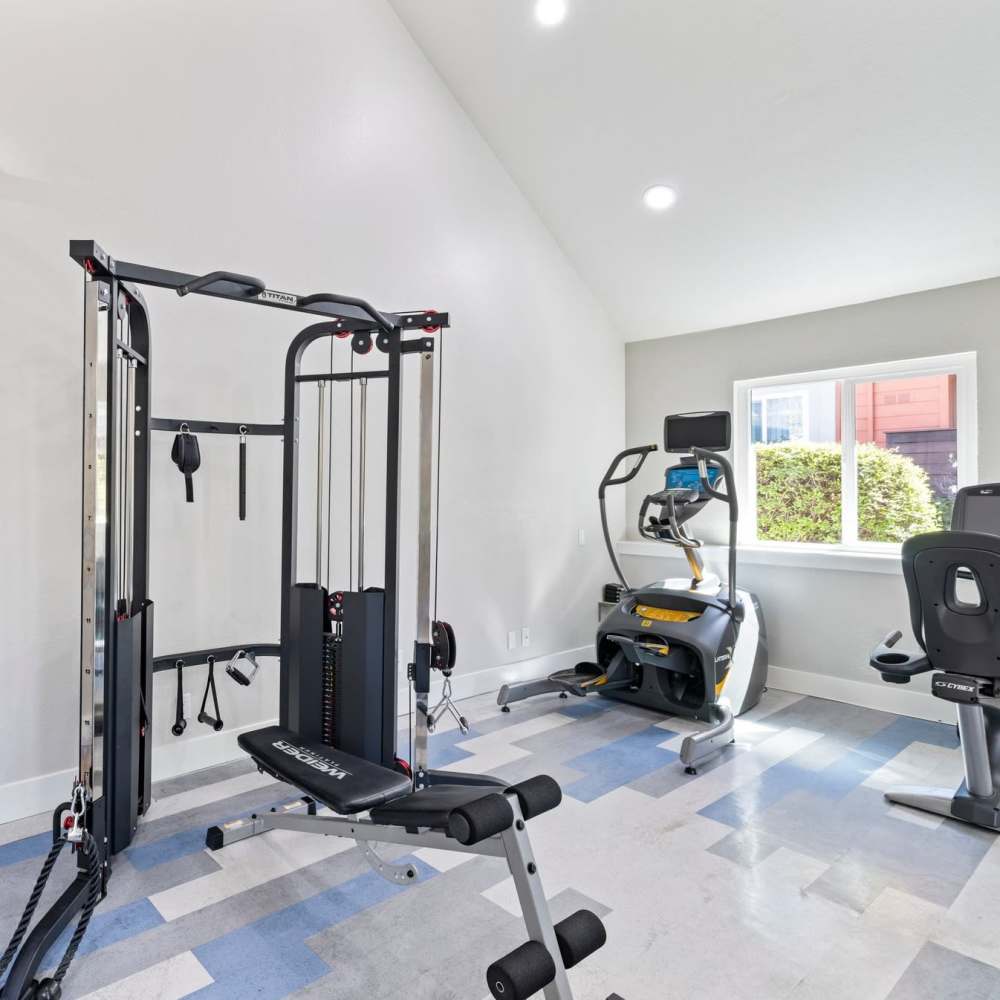 Fitness center with variety of equipment's at Crossbrook Apartments in Rohnert Park, California