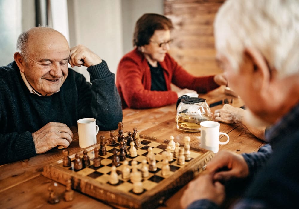 Residents playing chess at Kingston Bay Senior Living in Fresno, California. 