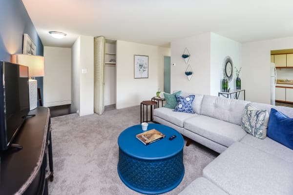 Spacious living rooms with wall-to-wall carpeting at Marchwood Apartment Homes in Exton, Pennsylvania
