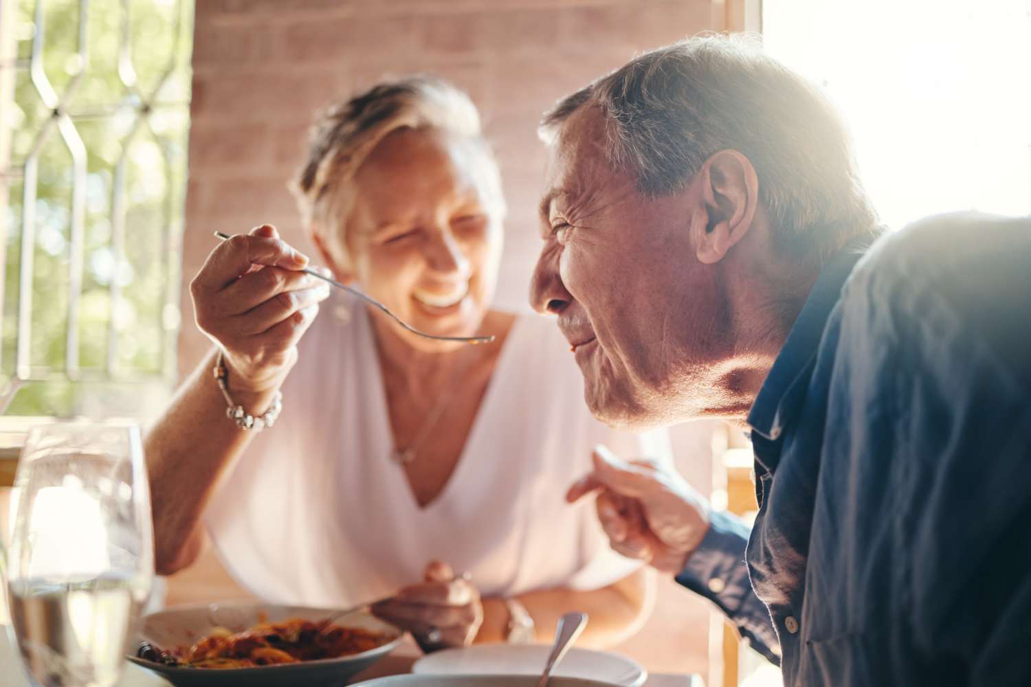 Couple at a restaurant Casa de Sierra Senior Apartments in Albuquerque, New Mexico