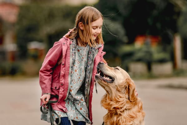 Child walking her dog at Lattitude34 Dillard Creek in Greer, South Carolina