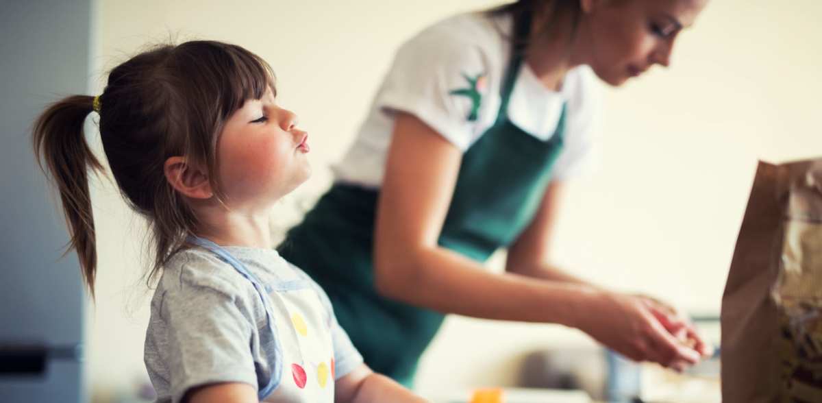 Mother and daughter bake cookies in their kitchen at Rockwood Park, Richmond, Virginia