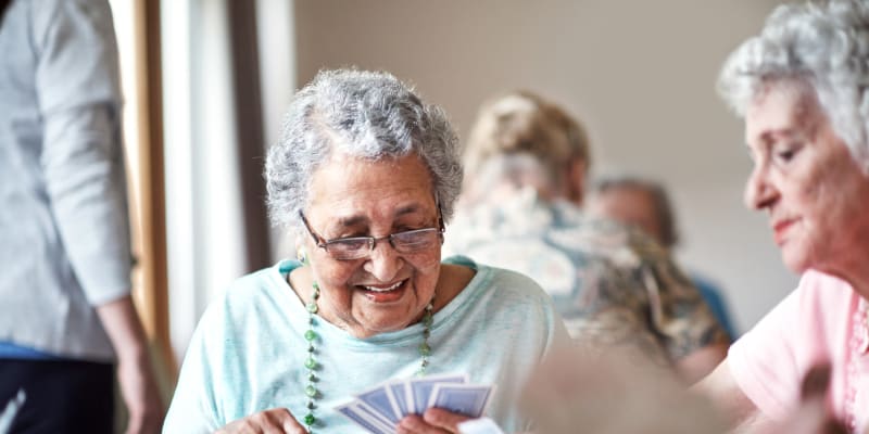 Residents playing cards at The Blake at Colonial Club in Harahan, Louisiana