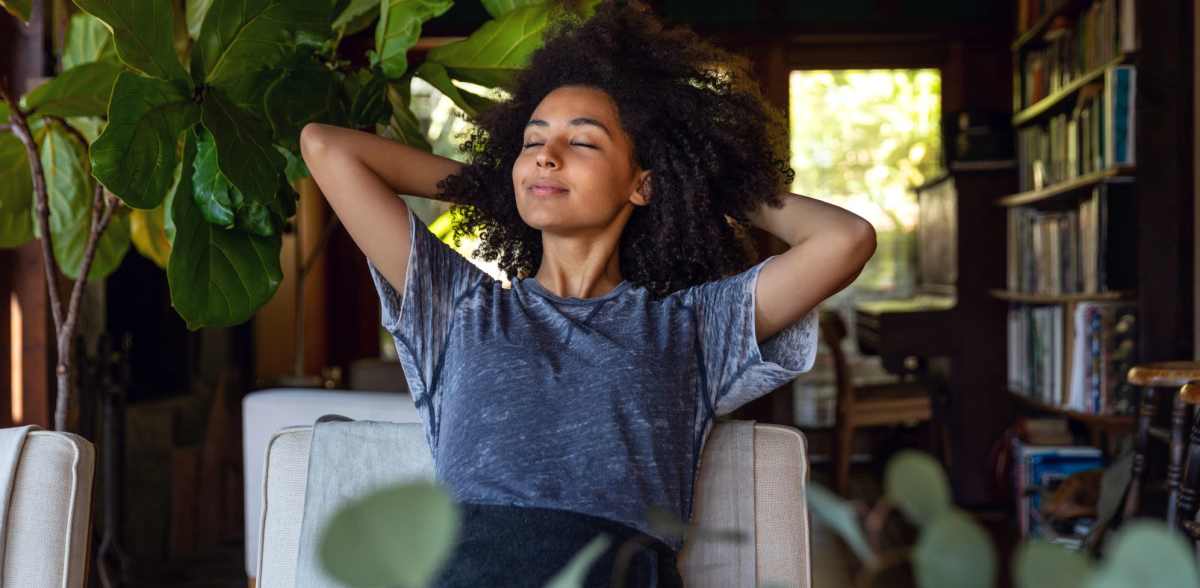 A resident relaxes in her apartment at Rockwood Park, Richmond, Virginia