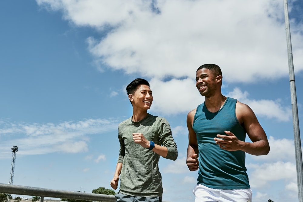 Residents jogging at Sierra Vista Apartments in Redlands, California