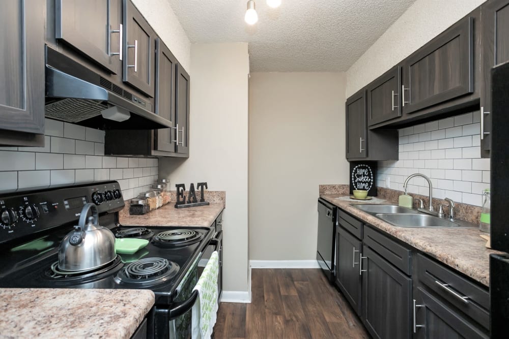 Modern kitchen at The Village at Crestview Apartments in Madison, Tennessee