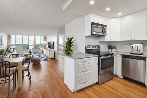 Open kitchen, dining and living area at Bristol Court in Mississauga, Ontario