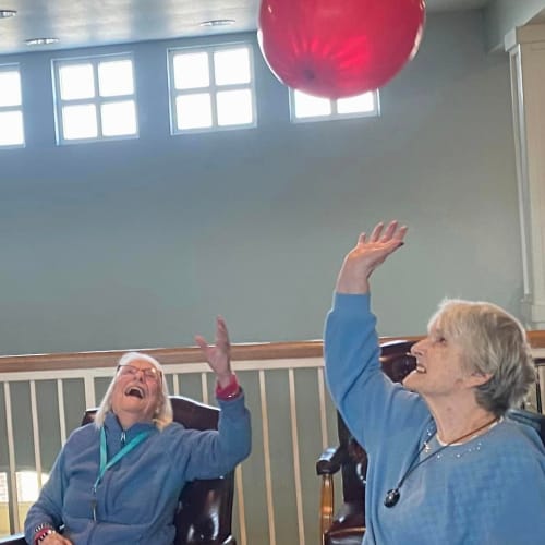 A resident with cake at Canoe Brook Assisted Living & Memory Care in Catoosa, Oklahoma