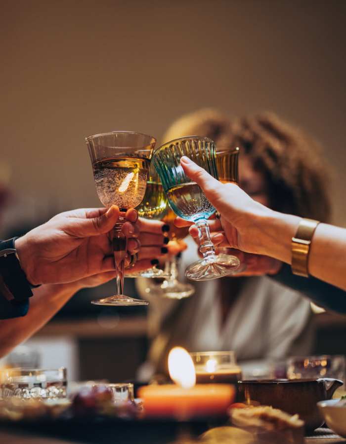 Resident raising a toast on a night out near Copper Beech Town Homes in Clovis, California