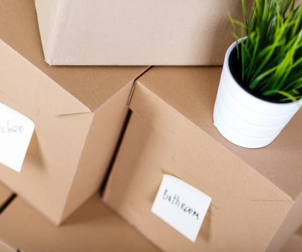 A stack of packed and labeled boxes at Airport Road Storage in Monterey, California
