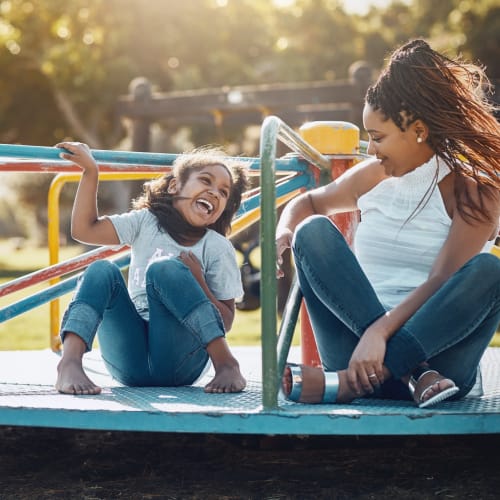 a mother and daughter playing at the park near Shadow Mountain in Twentynine Palms, California