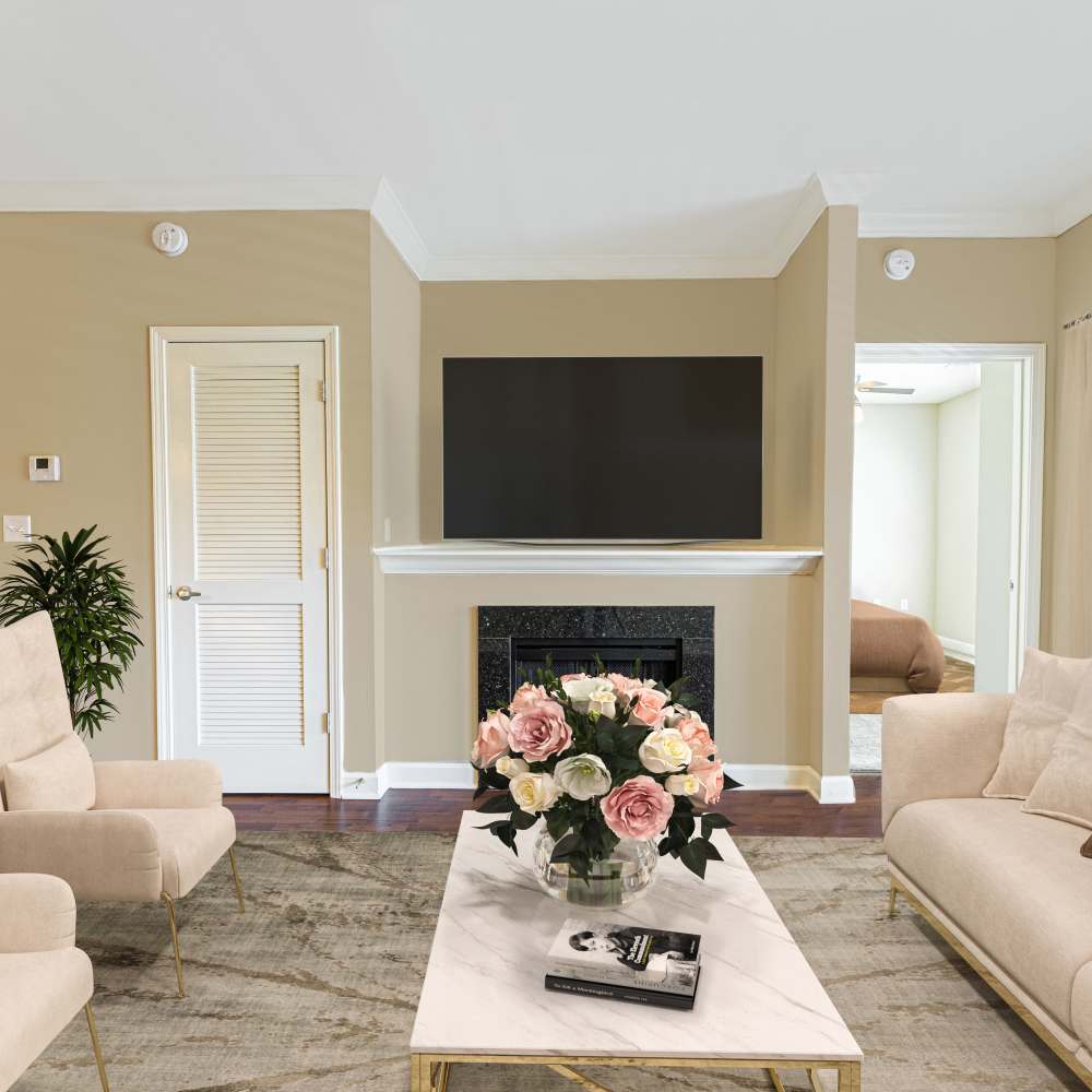 Living room with fireplace at Boulder Springs of Columbia in Columbia,Missouri