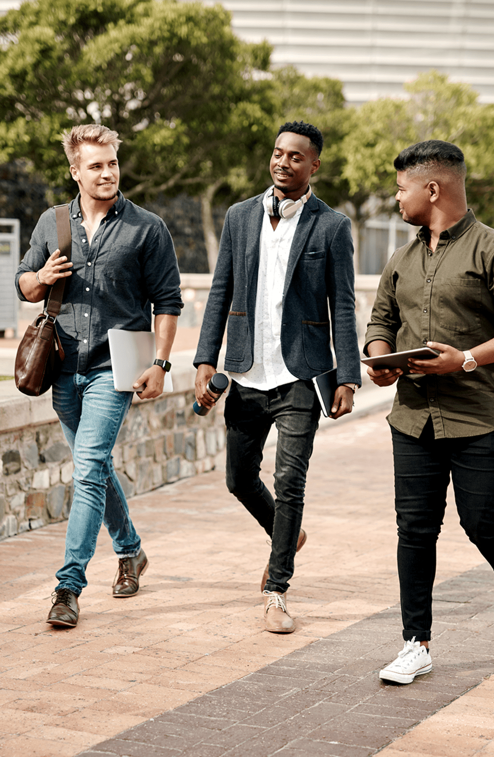Residents walking across campus near Abrams Run Apartment Homes in King of Prussia, Pennsylvania