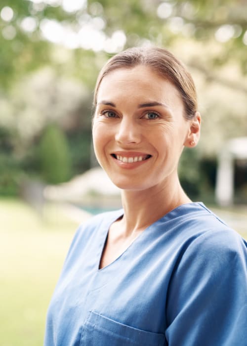 Caring nurse on her way in to work at Grand Villa of DeLand in DeLand, Florida