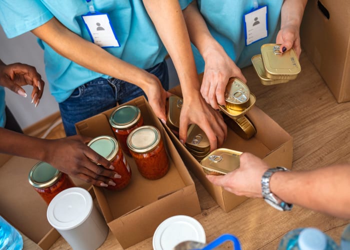 North County Self Storage in Escondido, California staff preparing a food donation box