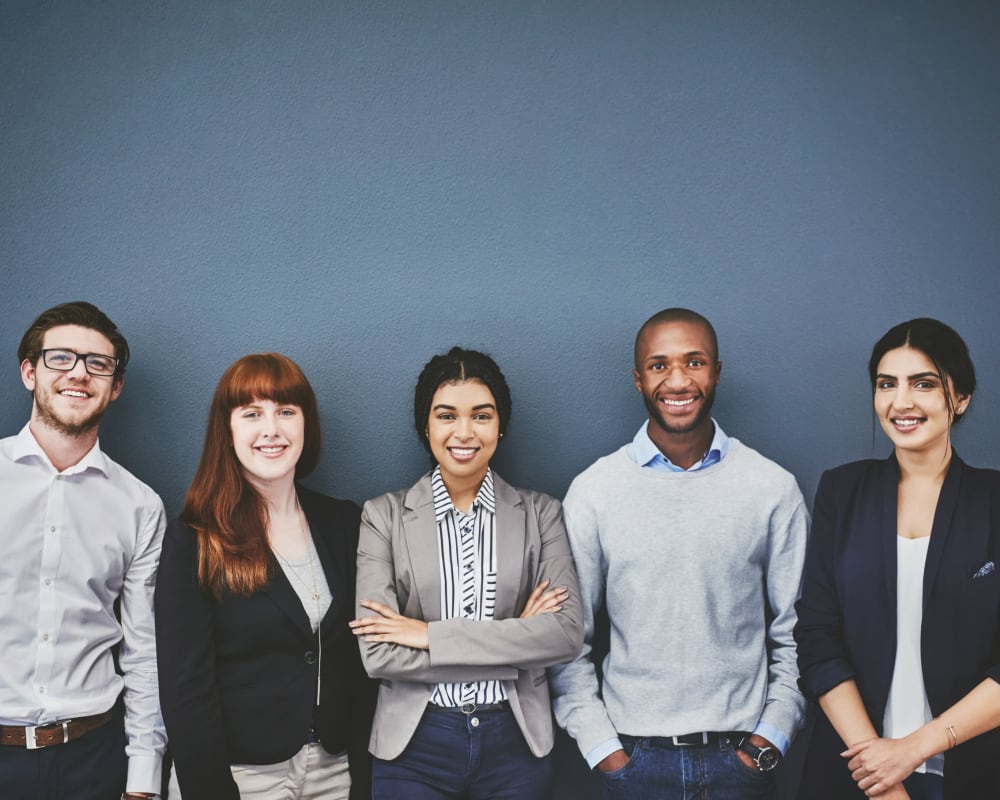 Employees posing for a photo at Vasona Management in Campbell, California