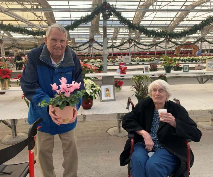 Resident couple visiting the Modesto Theater and poinsettia farm