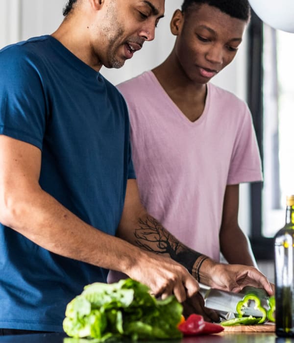 two residents cooking together at Shadow Creek in Santa Rosa, California