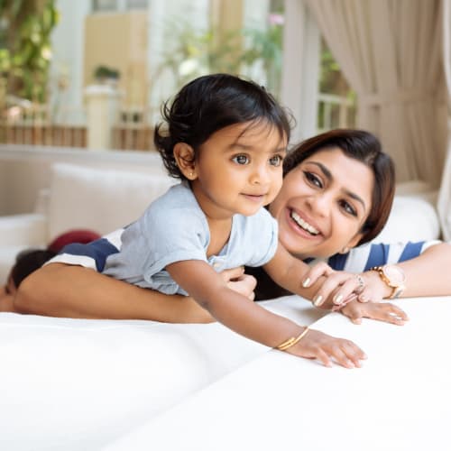 A mother holding her daguther at Albany Hill Village in Albany, Georgia