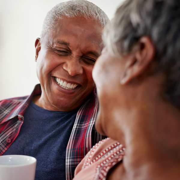 A resident couple smile at Acclaim at Cary Pointe, Cary, North Carolina