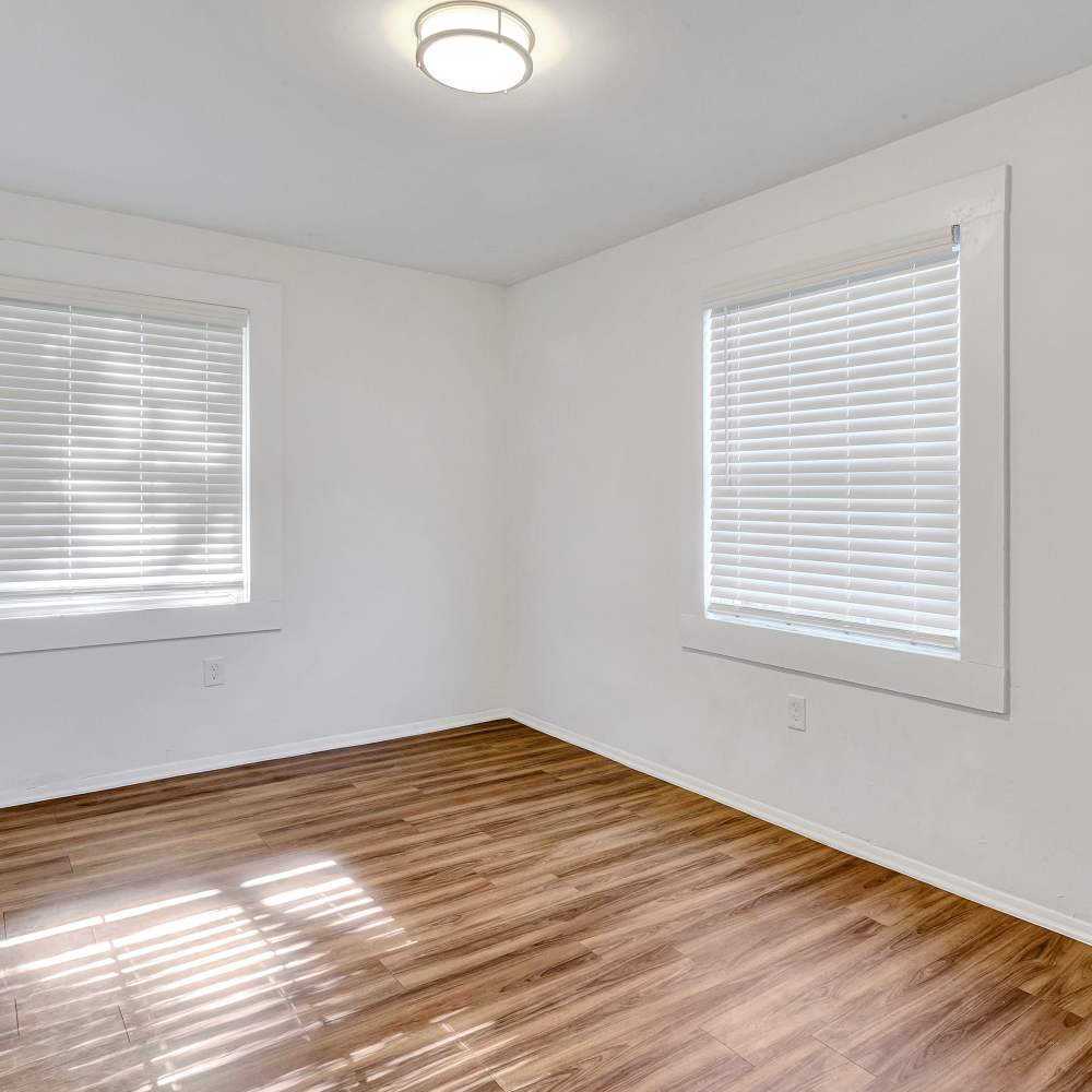 Room with a window and wood-style flooring at Park Vue Place in Richmond, Virginia