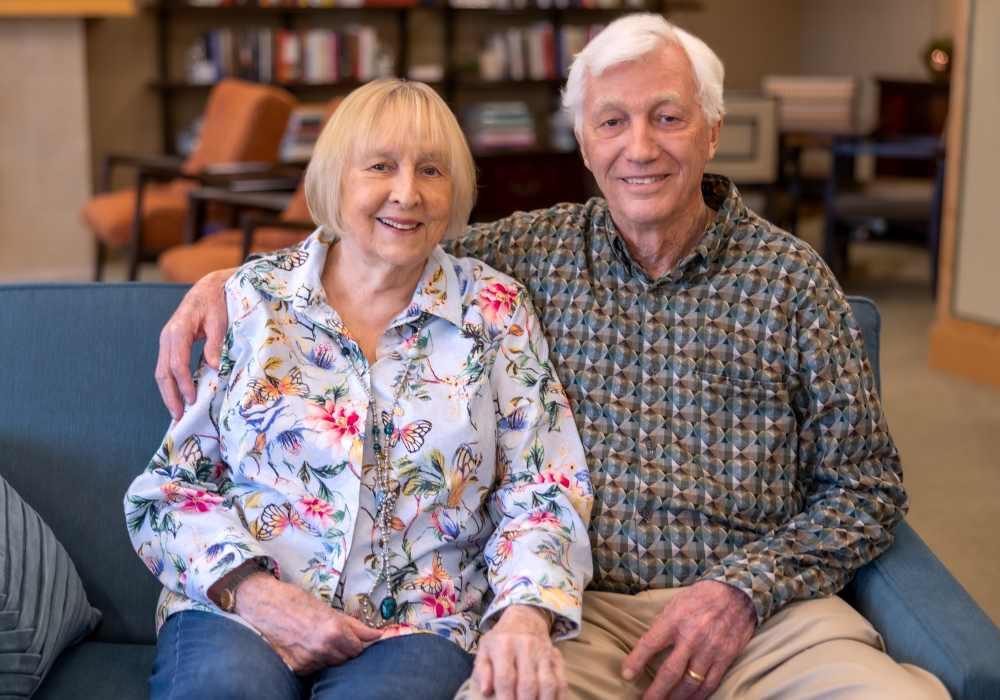 Couple on couch at Merrill Gardens at Bankers Hill in San Diego, California