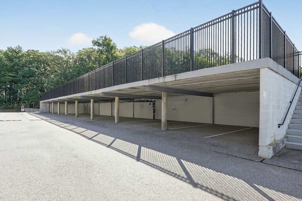 Carport parking for residents at Eagle Rock Apartments at MetroWest in Framingham, Massachusetts