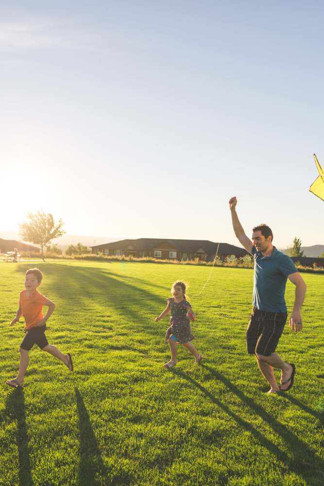 Residents in a park at Twin Creeks in Antioch, California