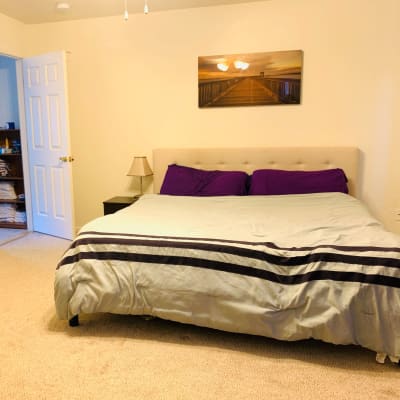 A furnished bedroom at Olympic Grove in Joint Base Lewis McChord, Washington
