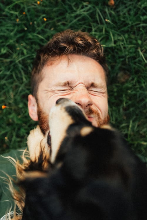 Resident getting licked by his dog at Parallel 36 at Jailette in Atlanta, Georgia