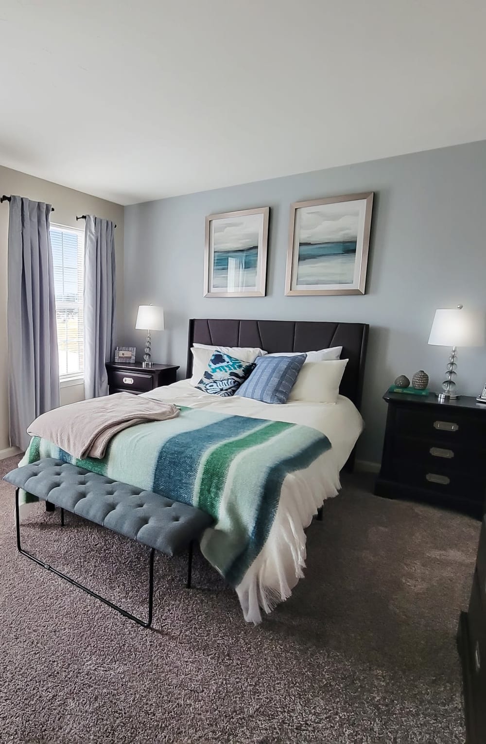 Bedroom of a model home at Lion