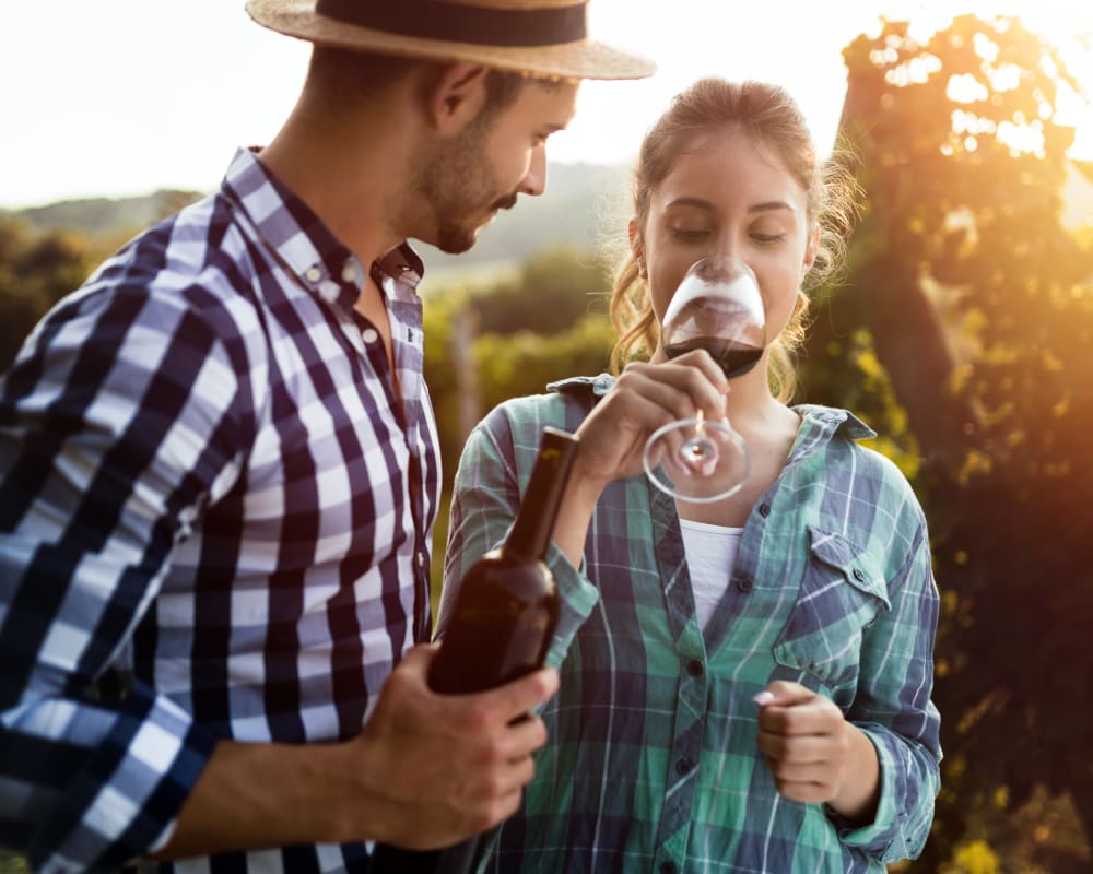 a couple out to drink wine near Sea Breeze Village in Seal Beach, California