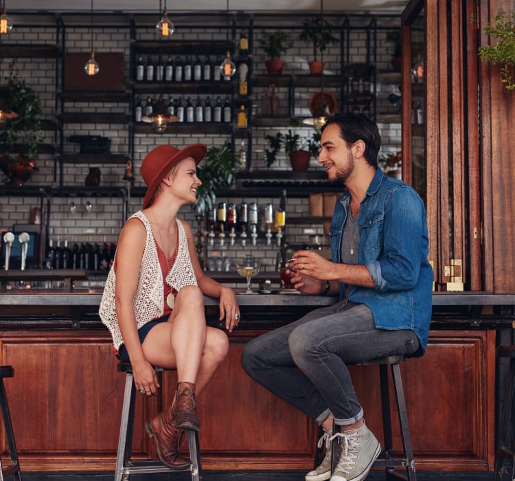 Residents chatting at locals' favorite bar near Sofi at 50 Forest in Stamford, Connecticut