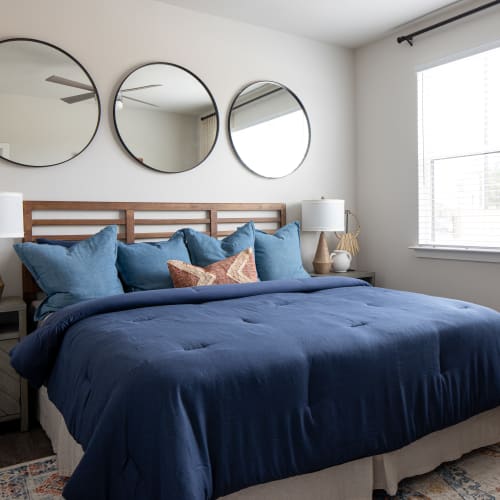 Bedroom with modern art at Bellrock Memorial in Houston, Texas