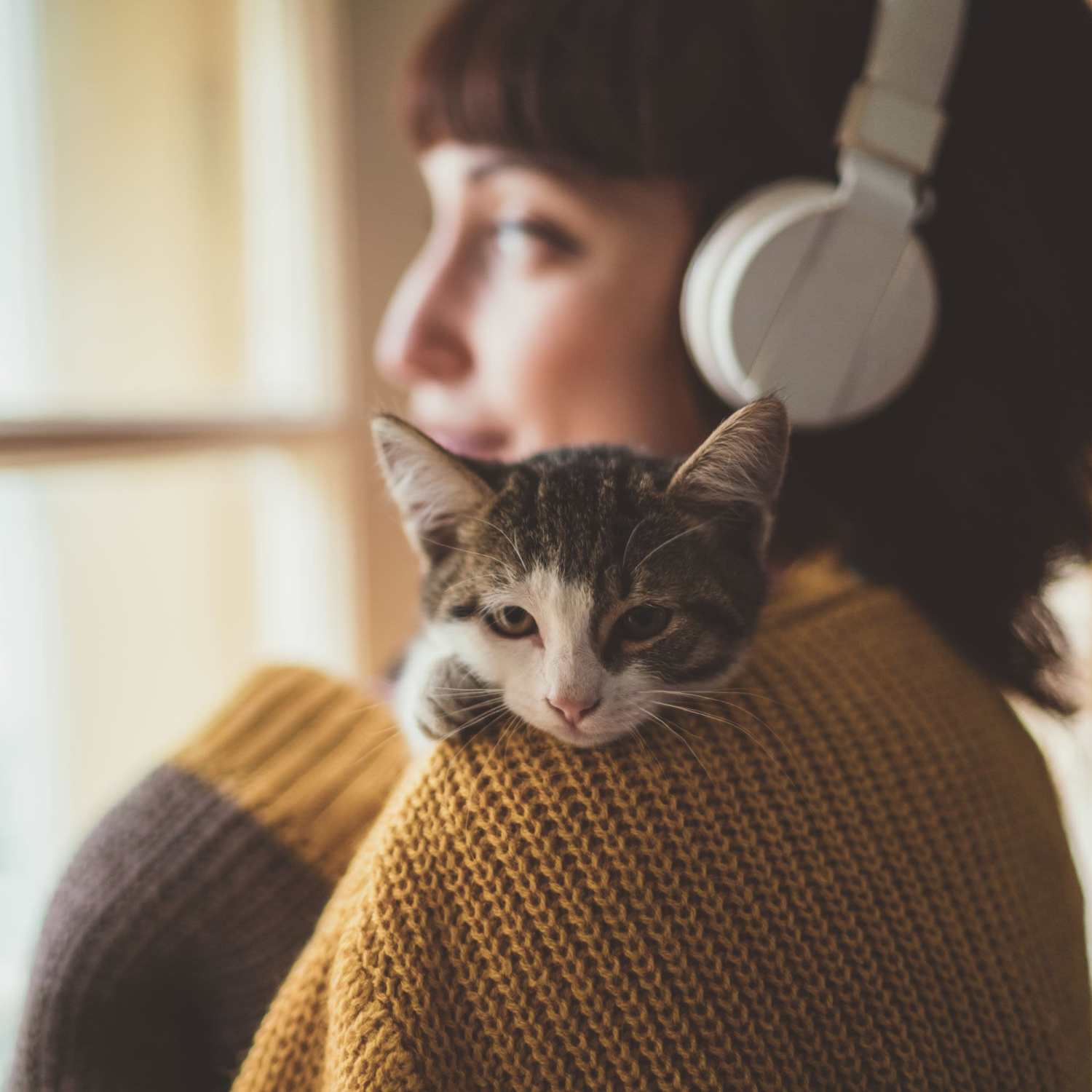 Resident holding her cat in their home at Thomaston Crossing in Macon, Georgia
