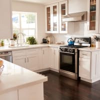 A model apartment kitchen with a window at Mode at Hyattsville in Hyattsville, Maryland