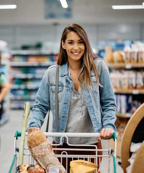 Resident buying groceries at The Edison at Peytona in Gallatin, Tennessee