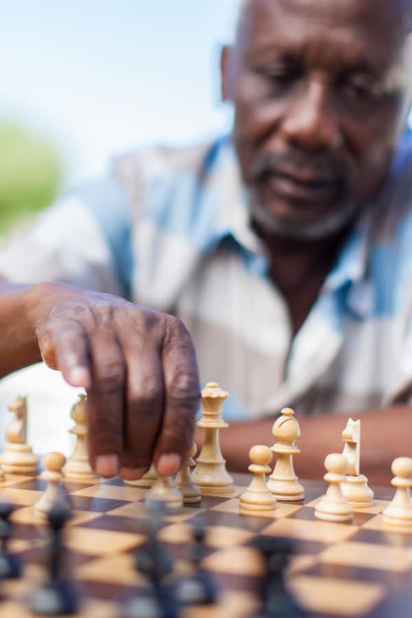 Resident playing chess at Truewood by Merrill, Glen Riddle in Glen Riddle, Pennsylvania
