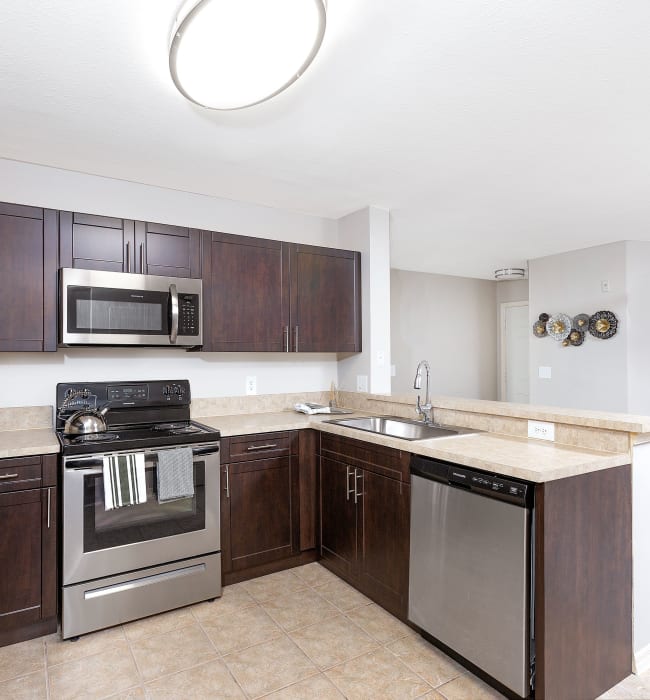 model kitchen at Club Lake Pointe Apartments in Coral Springs, Florida