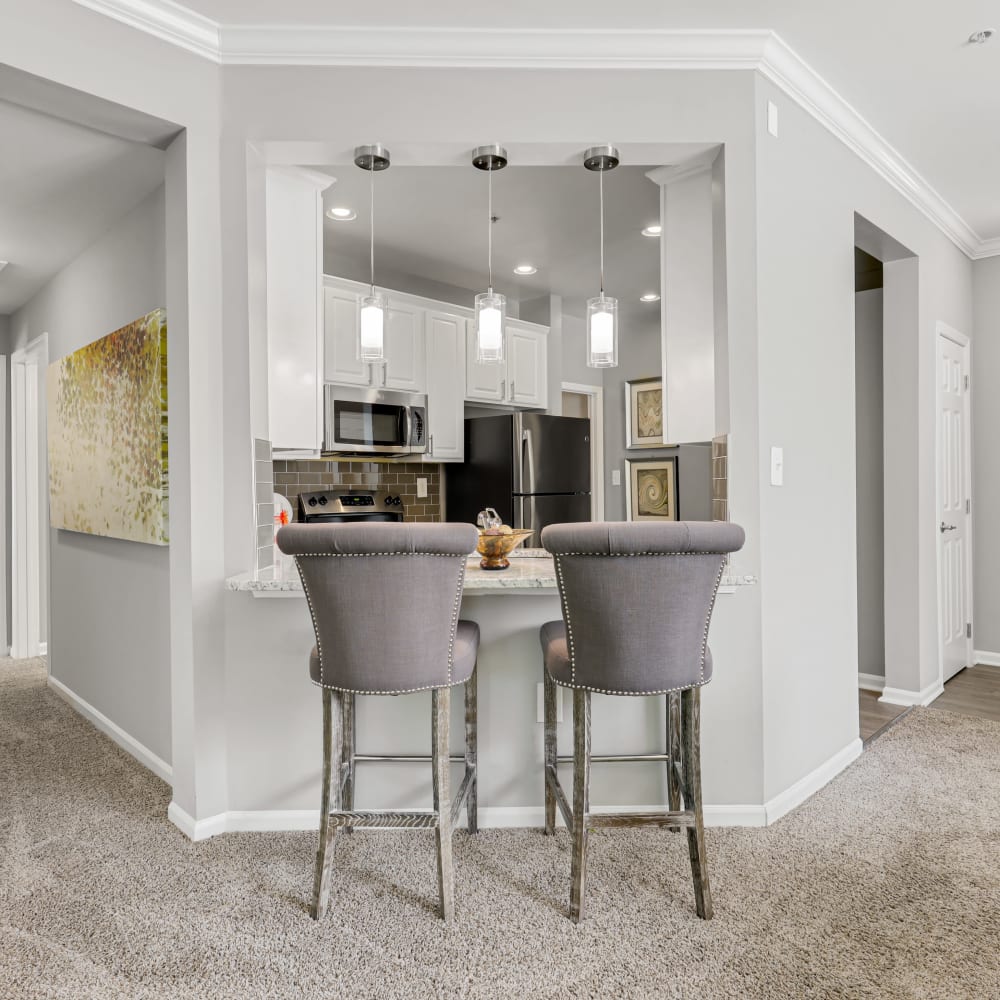 Bar seating at a kitchen counter at The Courts of Avalon in Pikesville, Maryland