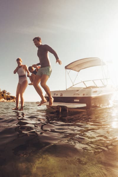 A family enjoying their boat while it's out of storage at Jamacha Point Self Storage in Spring Valley, California