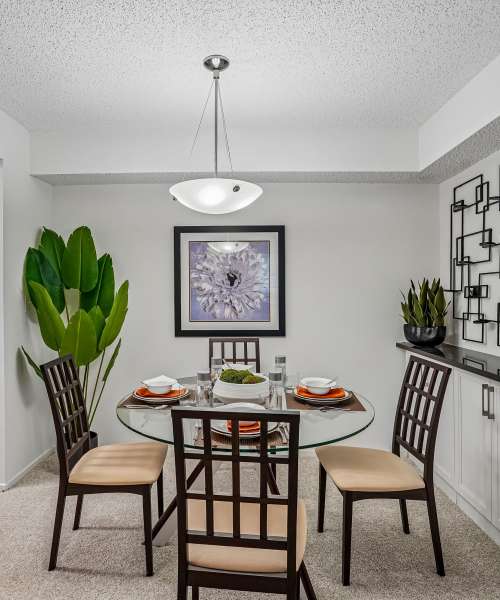 Dining area with table and chairs at Citation Club in Farmington Hills, Michigan