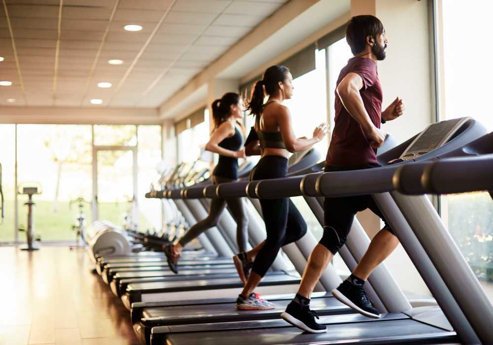 Residents jogging on the treadmill at the community fitness center at Calm at Northtowne in Reno, Nevada 