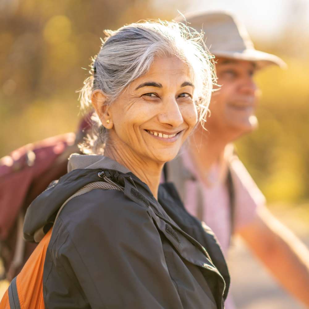 Residents enjoying a walk in nature near Grande Oak III in Williamsburg, Virginia