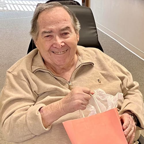 Resident with a fresh haircut in the sallon at The Oxford Grand Assisted Living & Memory Care in McKinney, Texas