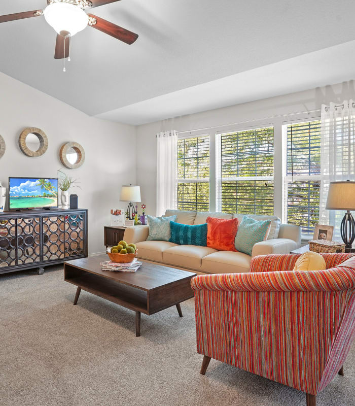 Spacious living room with large windows at Villas at Aspen Park in Broken Arrow, Oklahoma