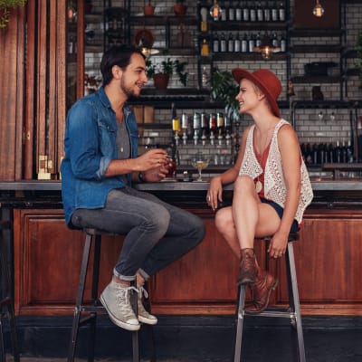 Residents chatting at their favorite local bar after work near Sofi Fremont in Fremont, California